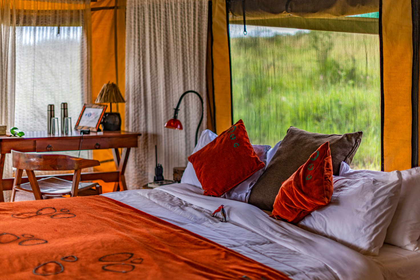 Partial view of bedroom in exclusive, luxury safari tented camp, in the Serengeti NP, Tanzania.